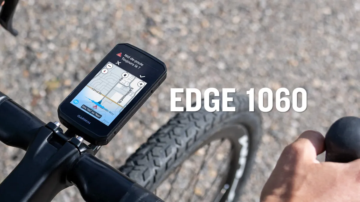 Garmin Edge 1060 fixé sur un cintre de vélo, alerte nid-de-poule à l'écran